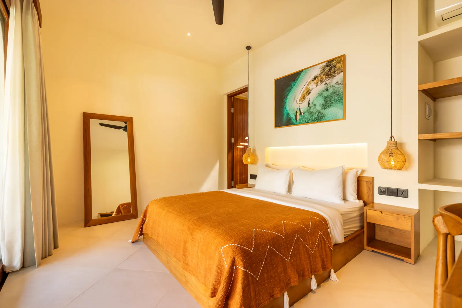 Deluxe Double Room with king bed, pendant lights and full-length mirror
