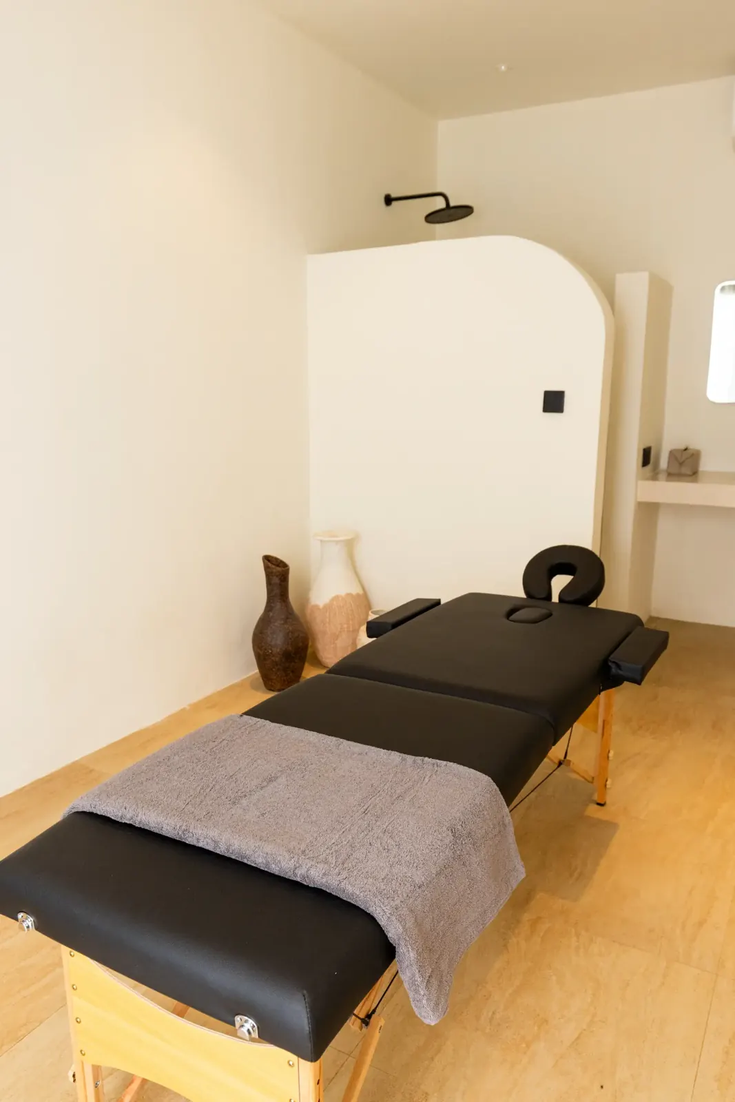 Massage table prepared in a treatment room at Uryah Spa